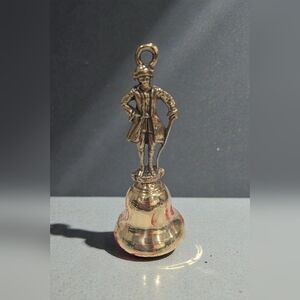 Vintage Colonial Brass Bell with Man In Attire